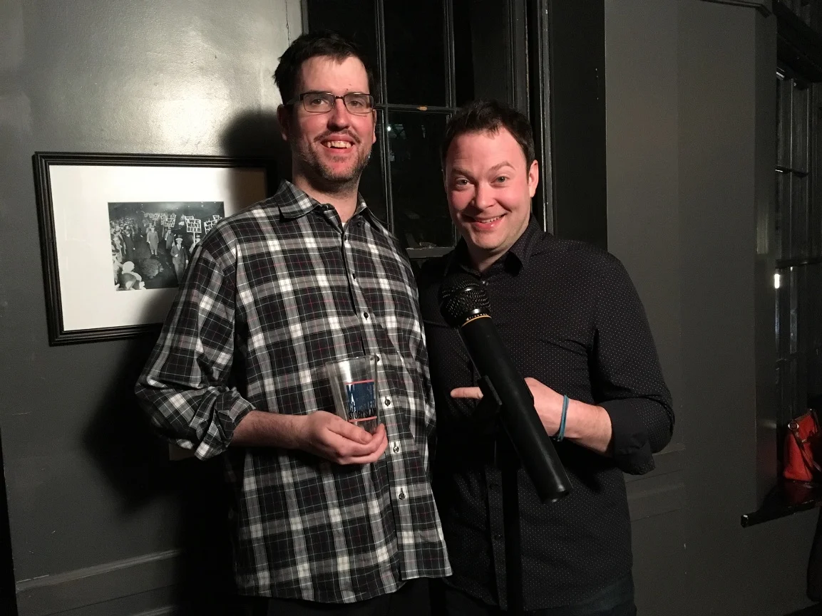 Winning Storyteller Steve Clark and emcee Mikey Gleason