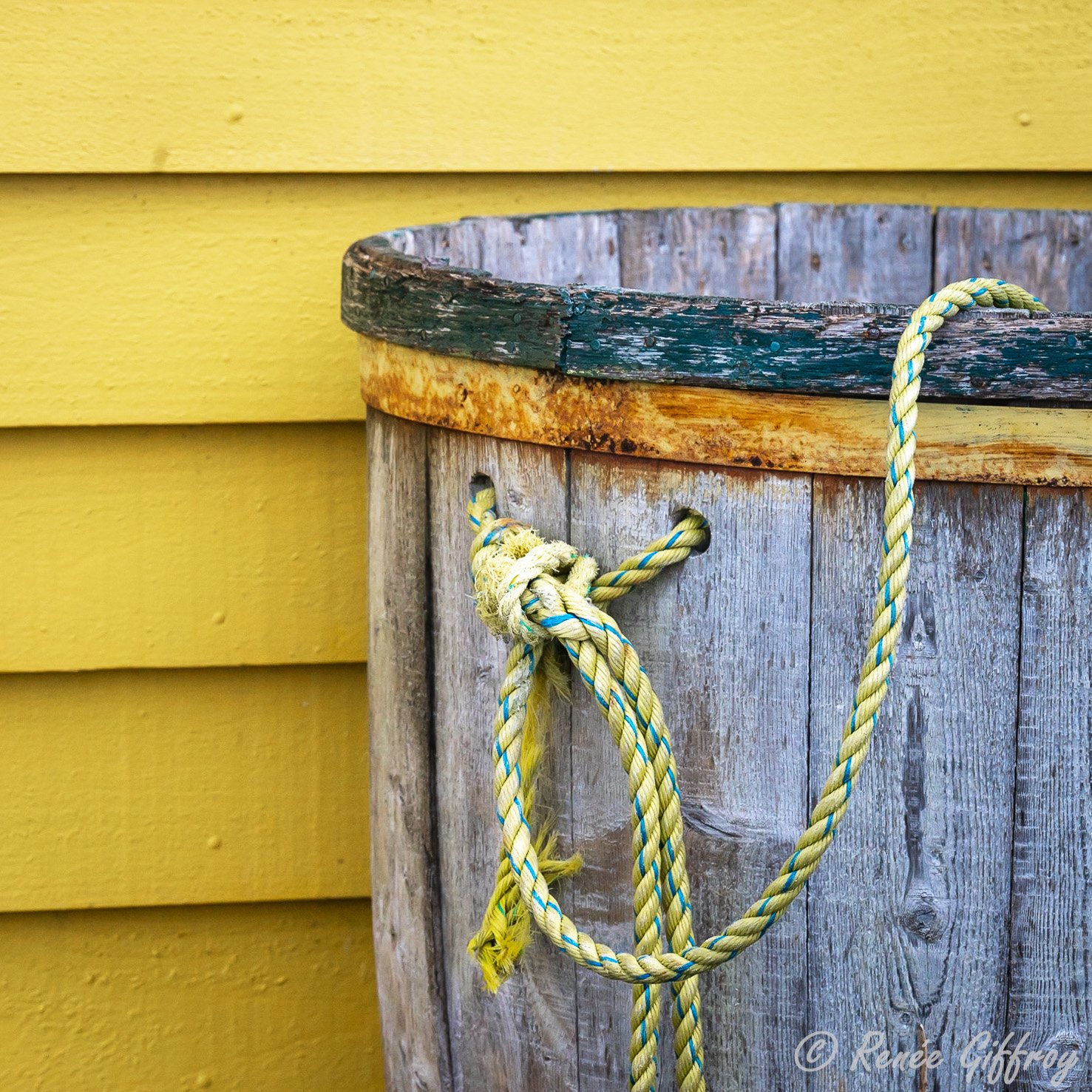 Bucket against Yellow shack_.jpg