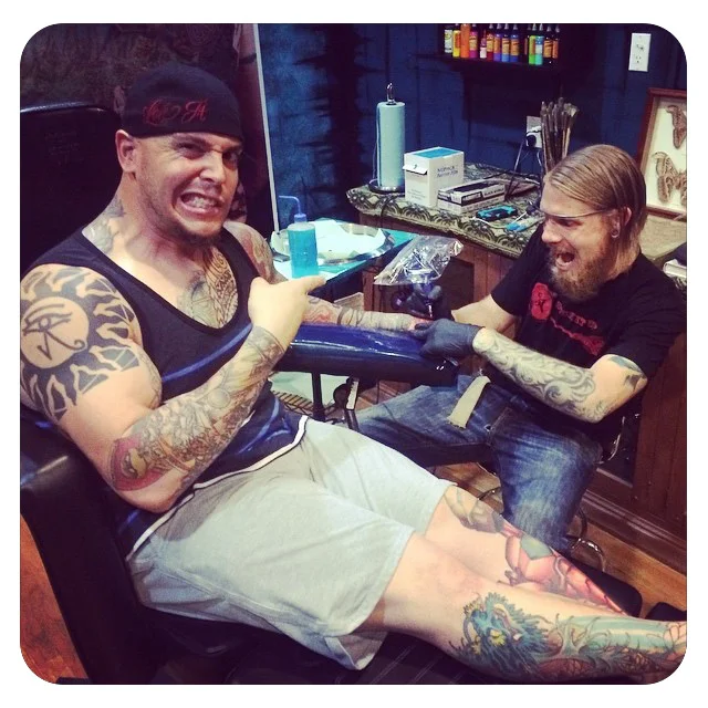 Shane working on Jason’s hand tattoo!
