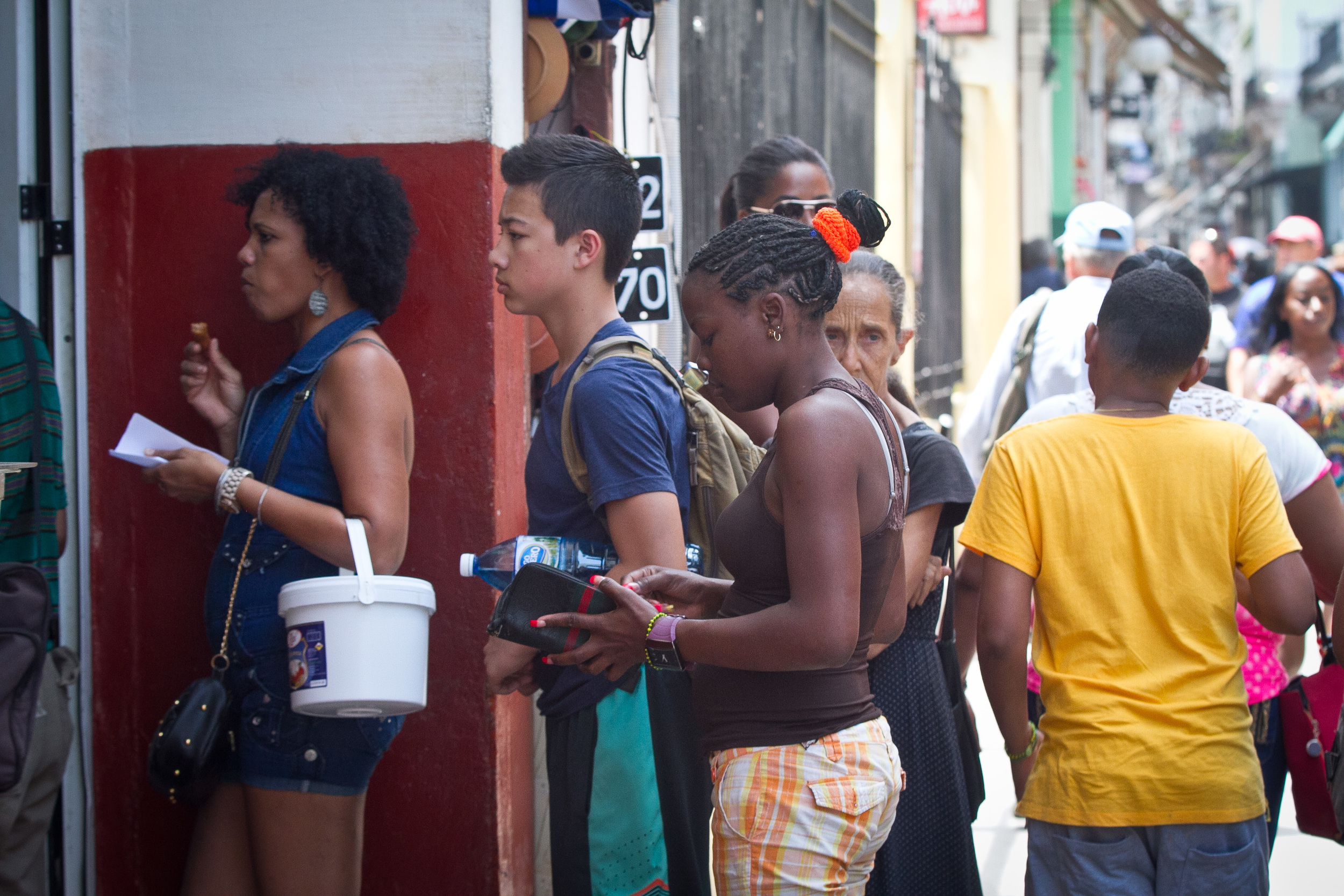 Teddy standing in line for a pretty darn good street Pizza. Cost? 10 CUP or about $.40