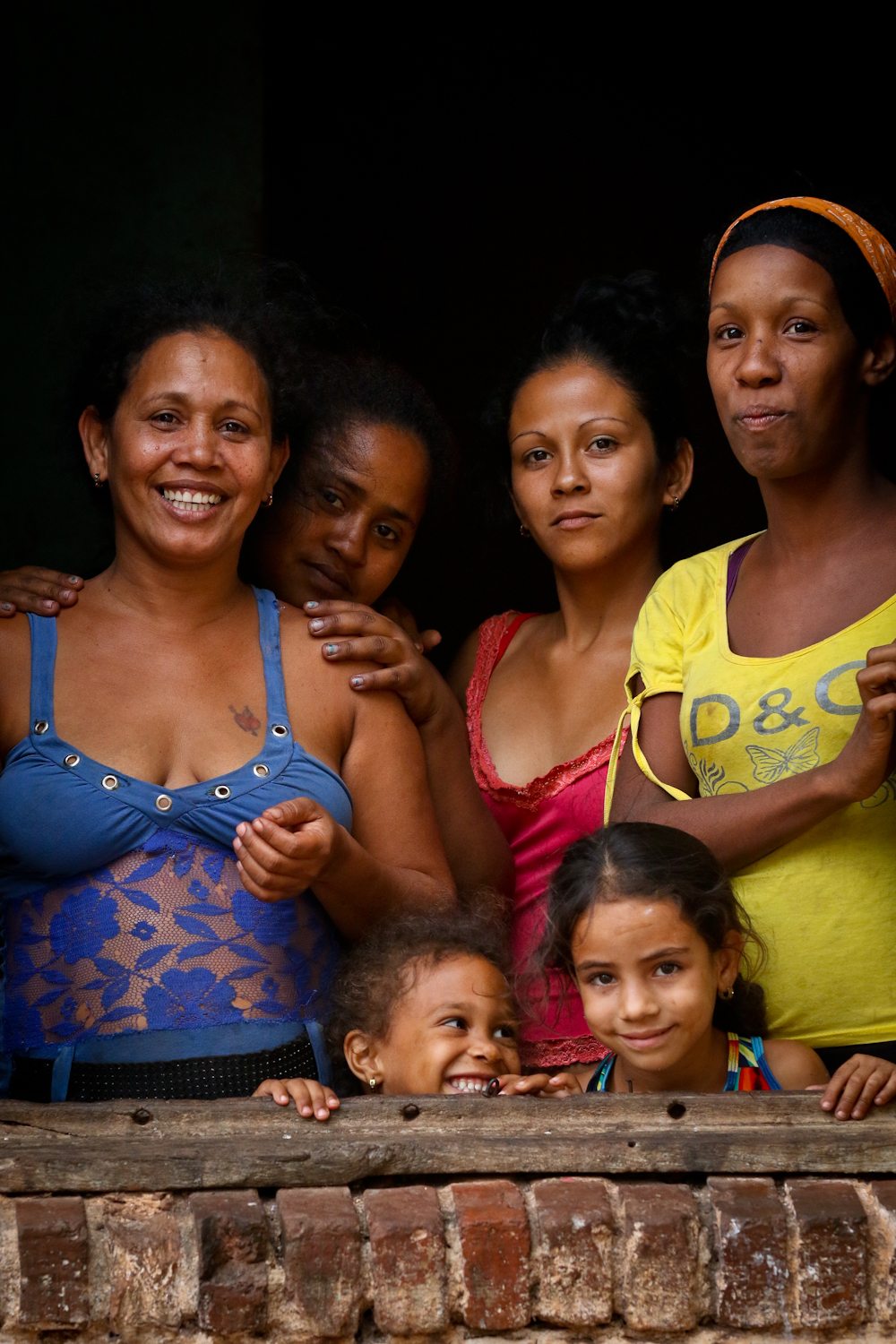 This might be my favorite people shot of the trip. In the small town of Brasil in the rural countryside, life is pretty tough. I was stopped on the street by some guys wanting me to take their photo, and when I was done I saw all these gals watching from the window of their shabby building. Look at their faces! In can see Joy in one, Shyness in the next, Confidence on another, and Uncertainty in the last. 