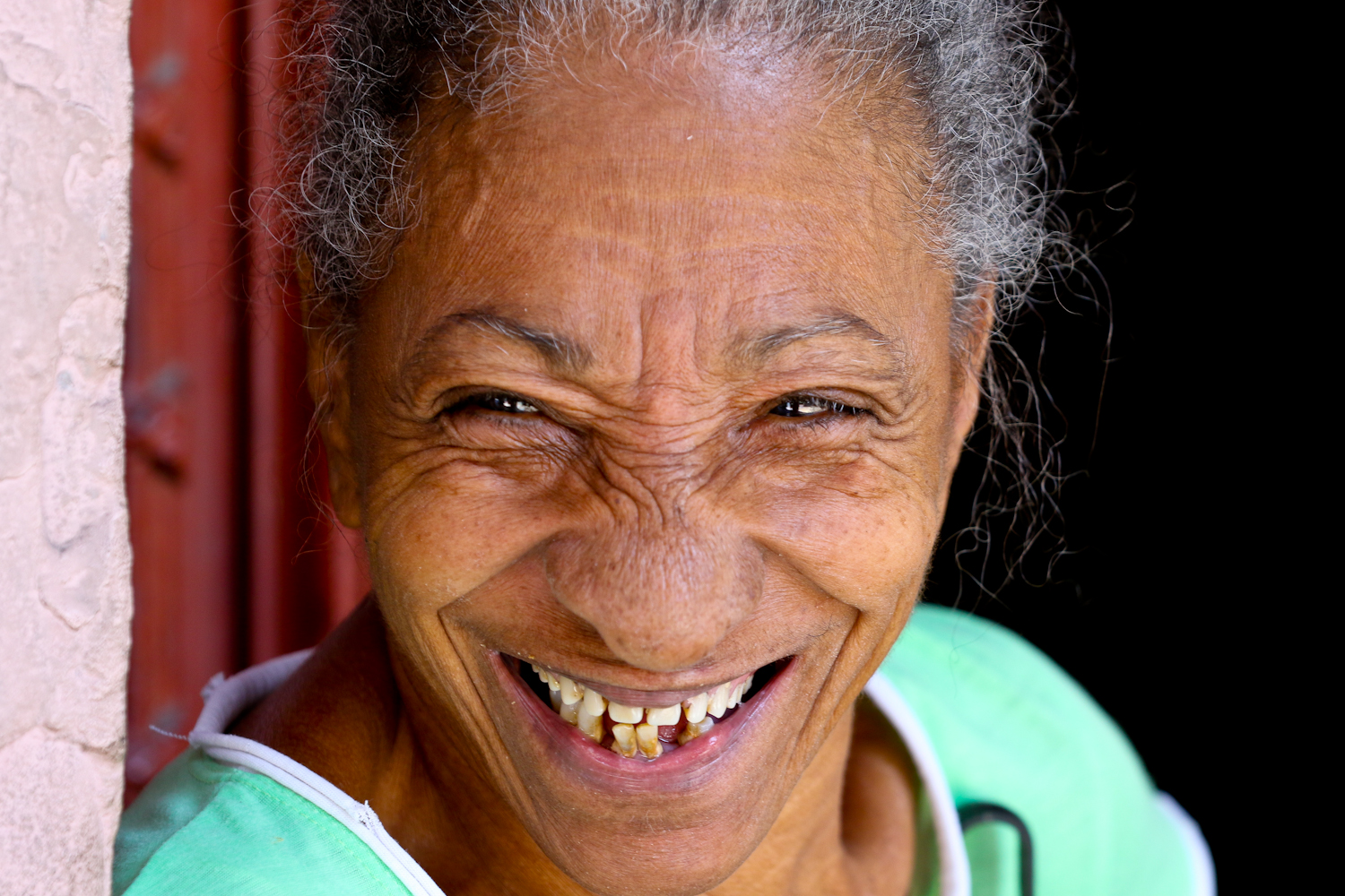 Again in Havana, and again exploring the back streets, my son and I saw this lady staring at us from her doorway. Even without a big camera and lens, we stick out. People will stare at you. Maybe it is the Nike shoes, or maybe that we just don't look like life has aged us so much. Anyway, we said hi, and joked with her, and then got this shot of her great face.