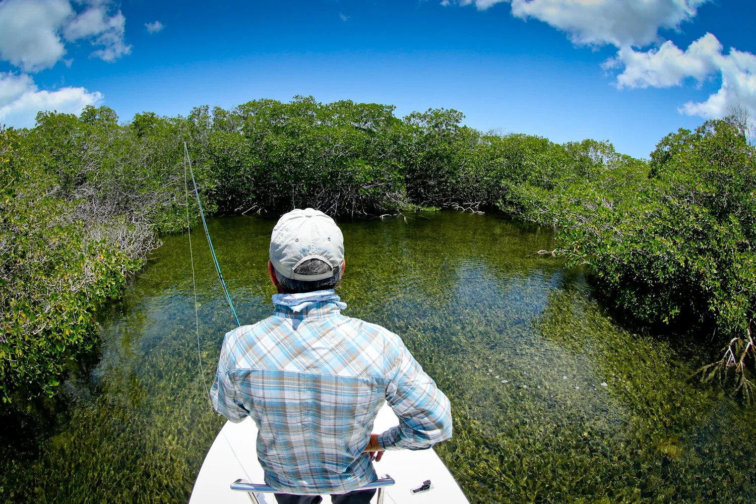 Tim on the bow in "Baby Tarpon" country.