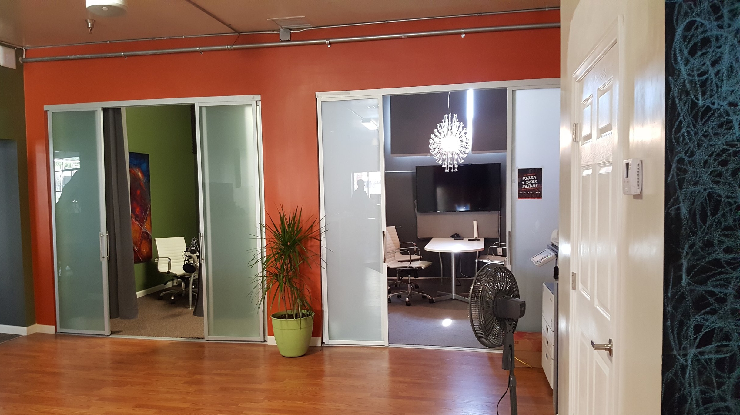 Samll meeting rooms are equipped to record podcasts or ideas on whiteboards.