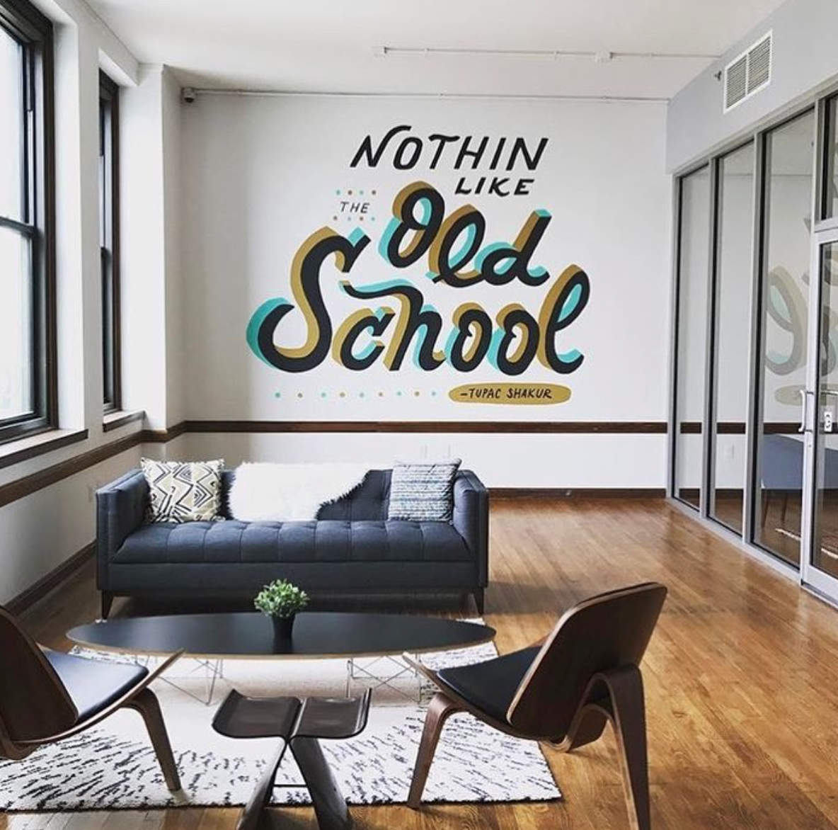 Plexpod Old School quote on wall.png