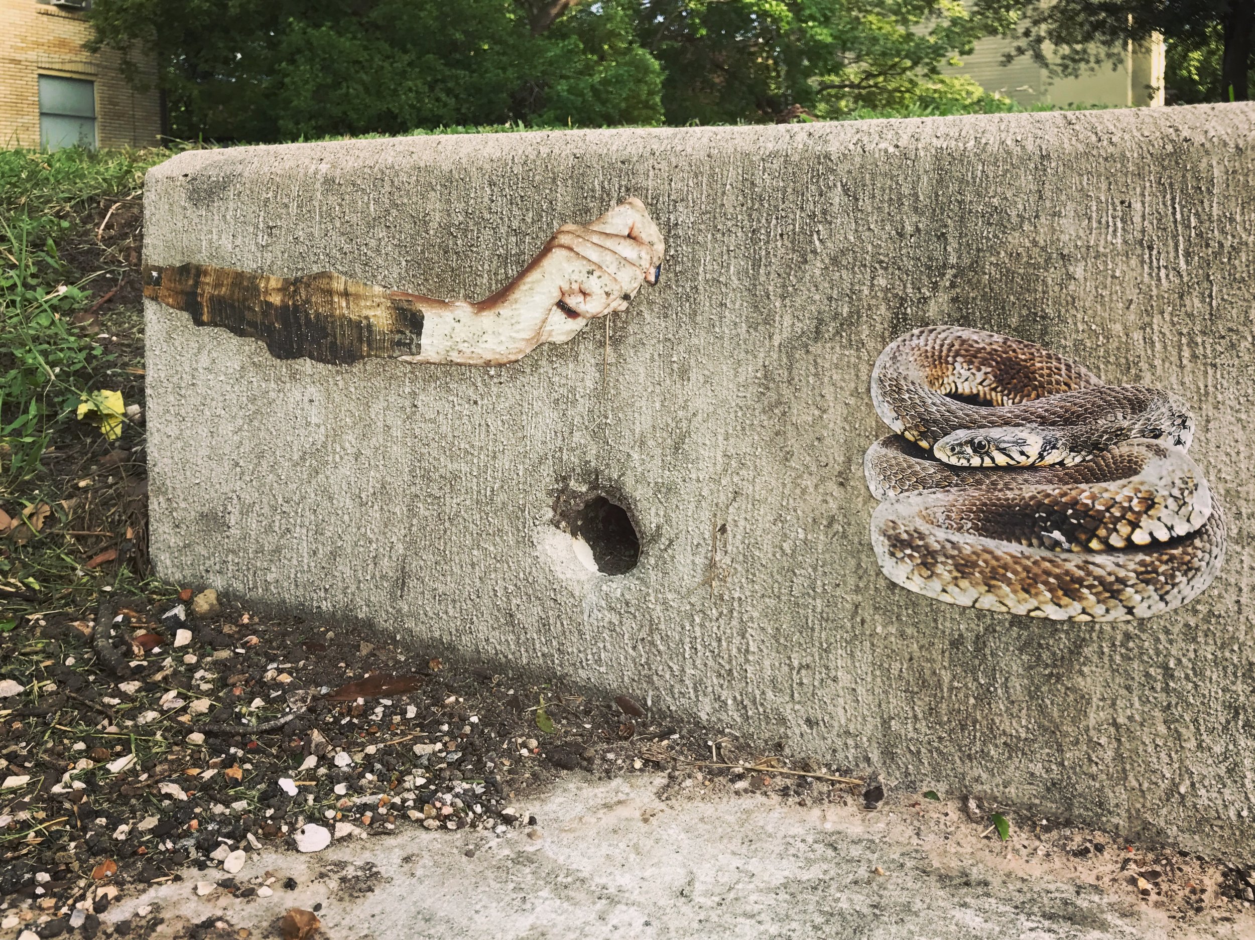  The curbside biblical wheatpasting effort survived Harvey 