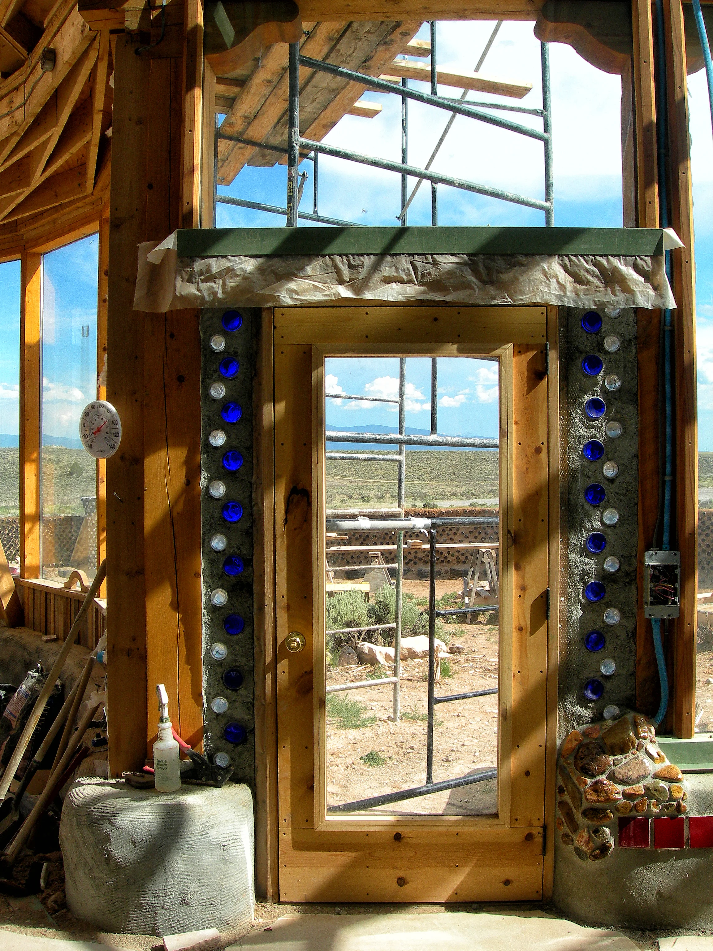 Susannah-Mira_Earthship-bottle-doorway.jpg