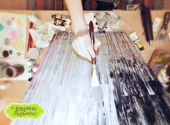 Josephine Kimberling painting in her studio