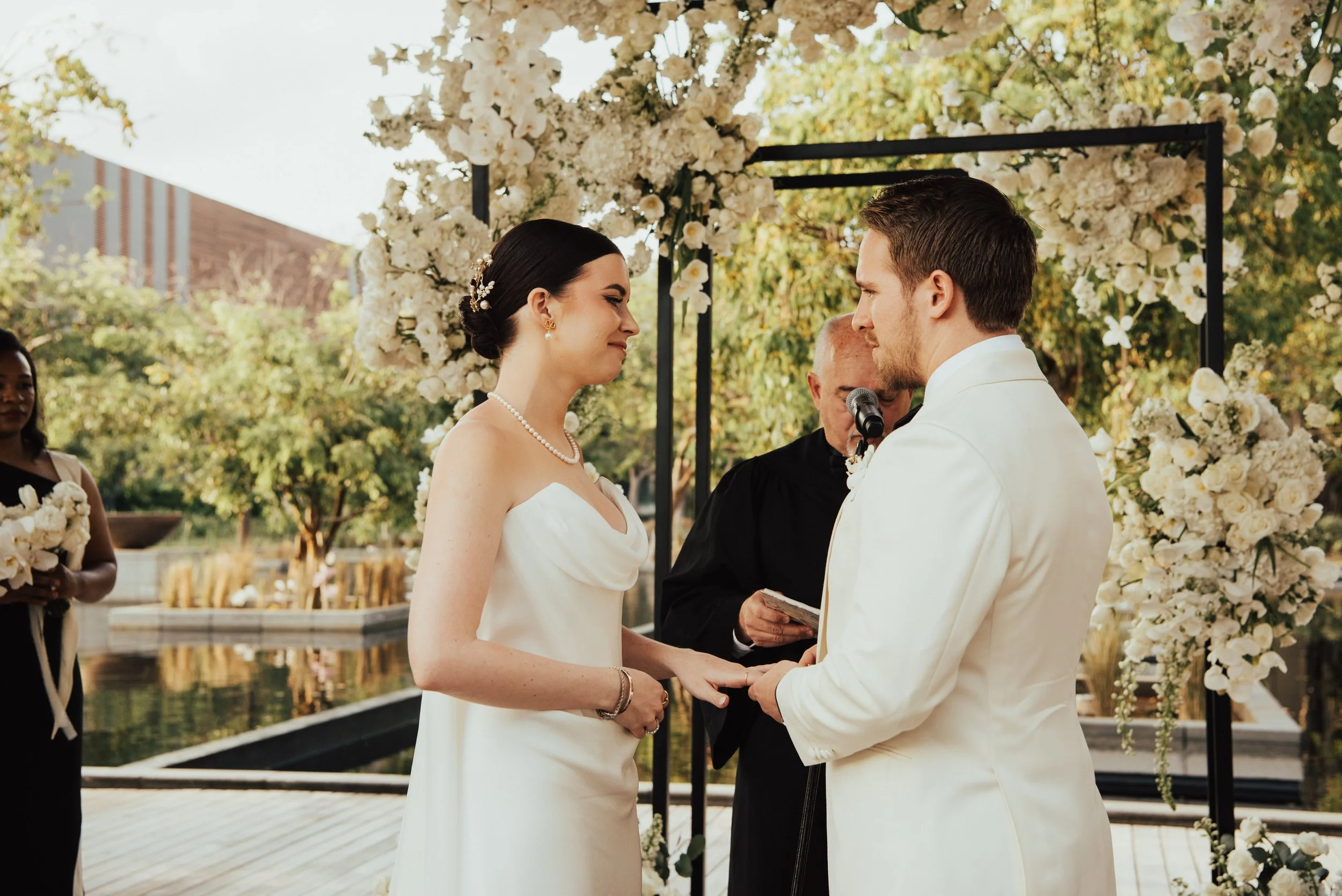 close up shot of bride and groom facing each other looking into each other eyes during there wedding cermeony