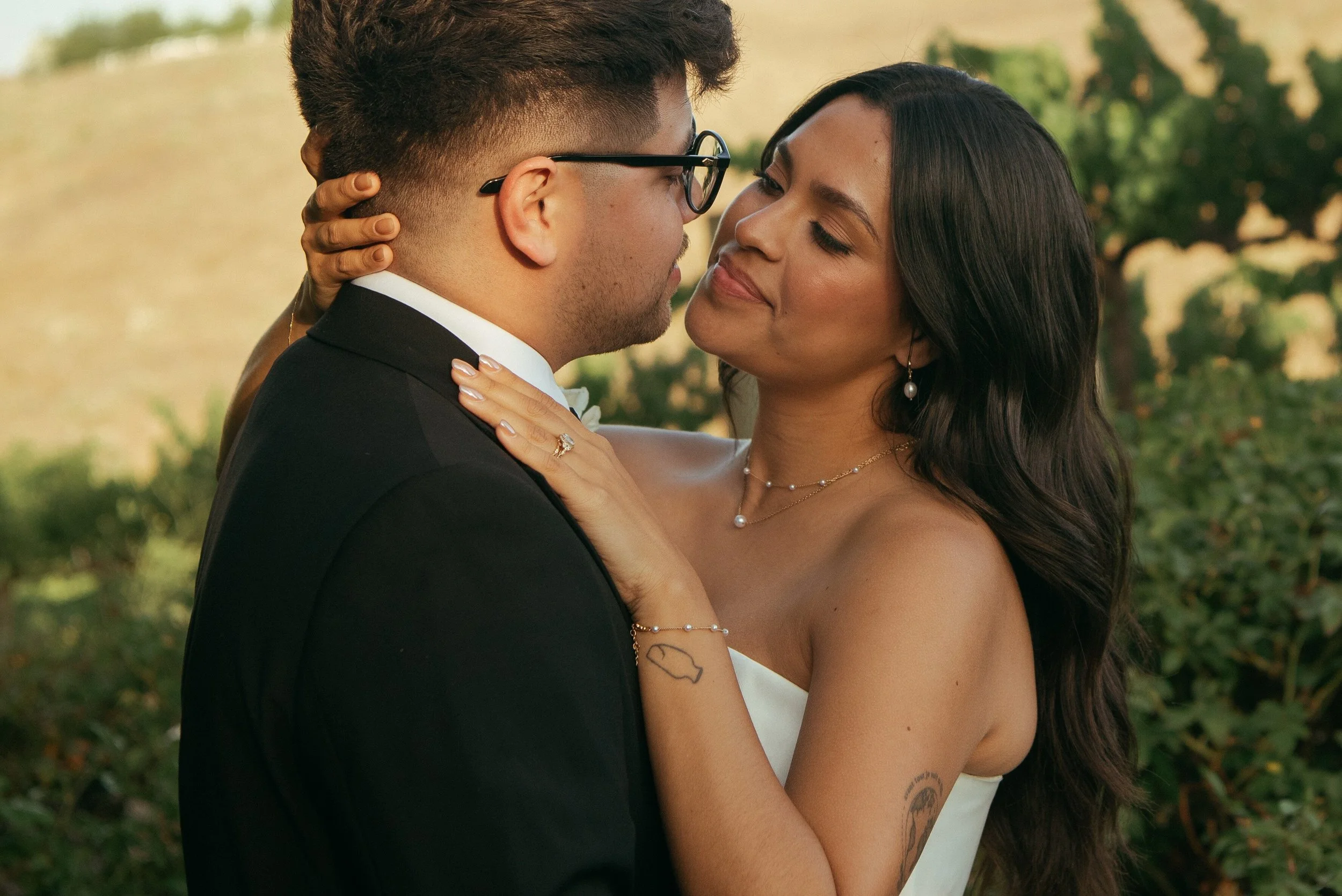 Close up of Bride and groom looking lovingly into each others eyes