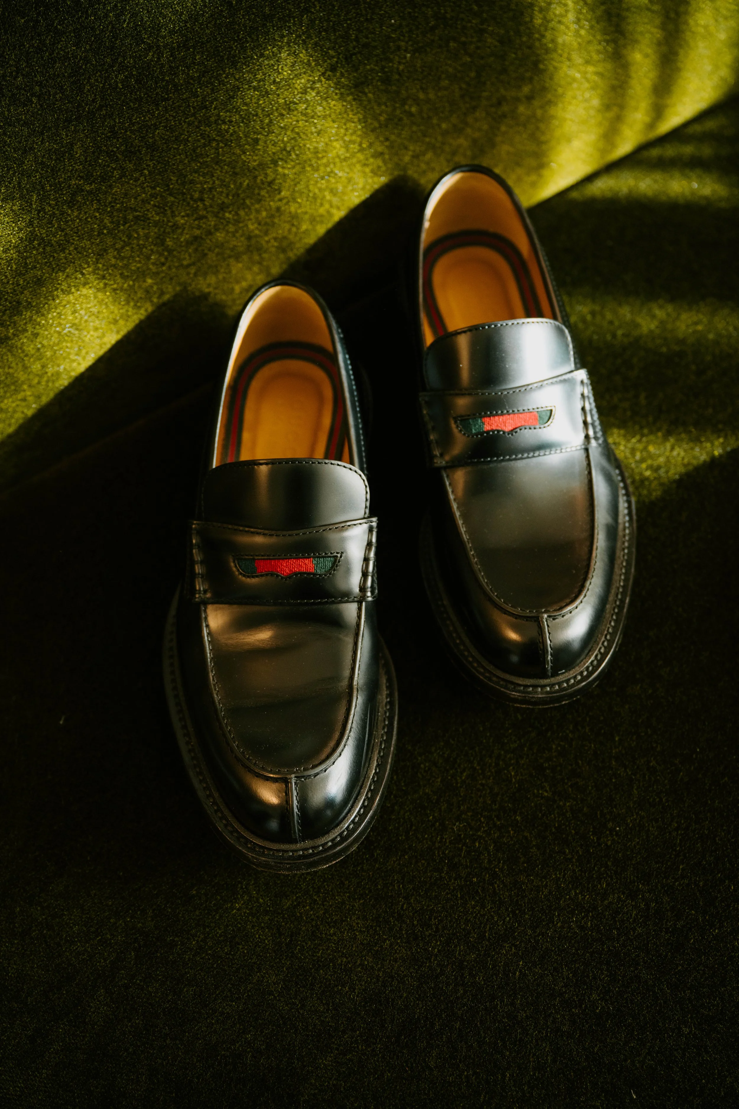 Picture of Men's Loafers on a green couch