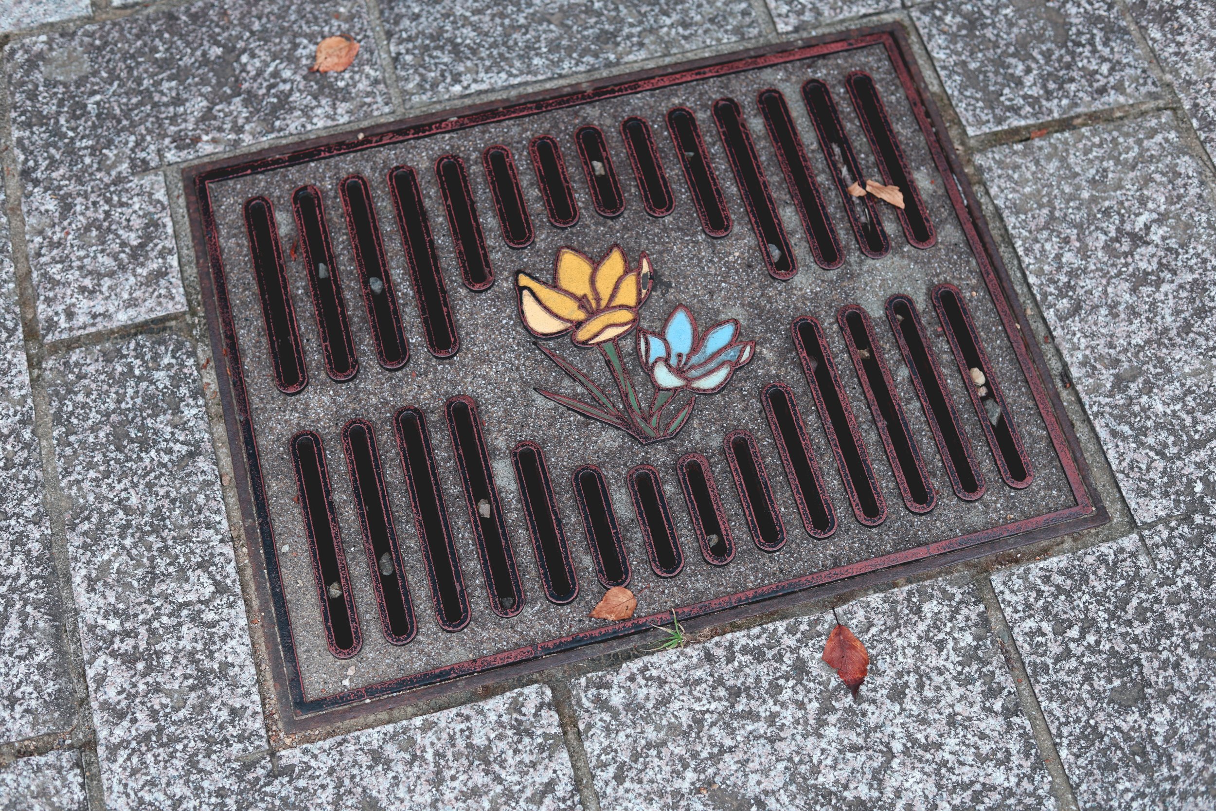 Nagasaki pavement grate flowers
