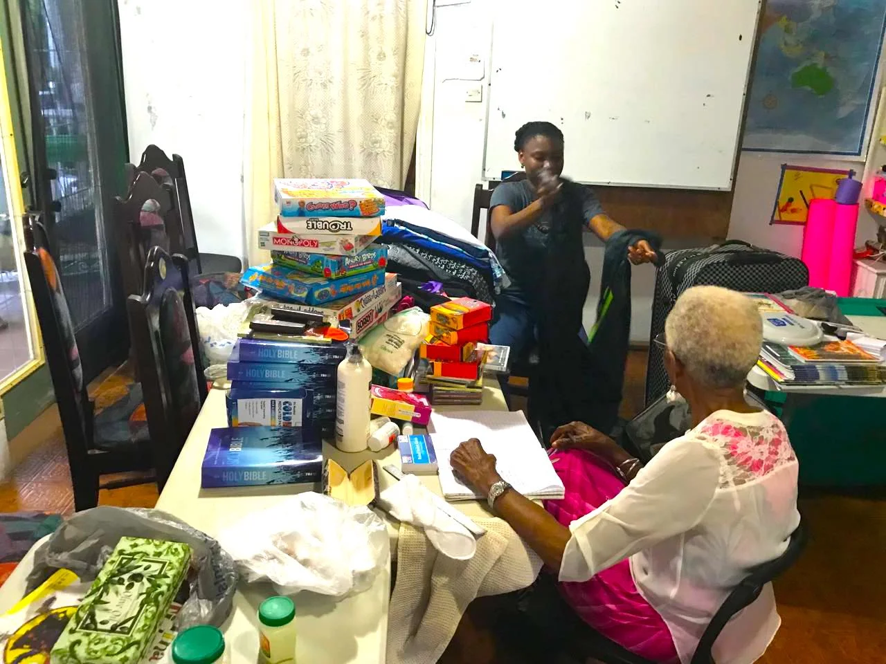 SORTING GIFTS FOR DONATION AT YWAM SL.jpg