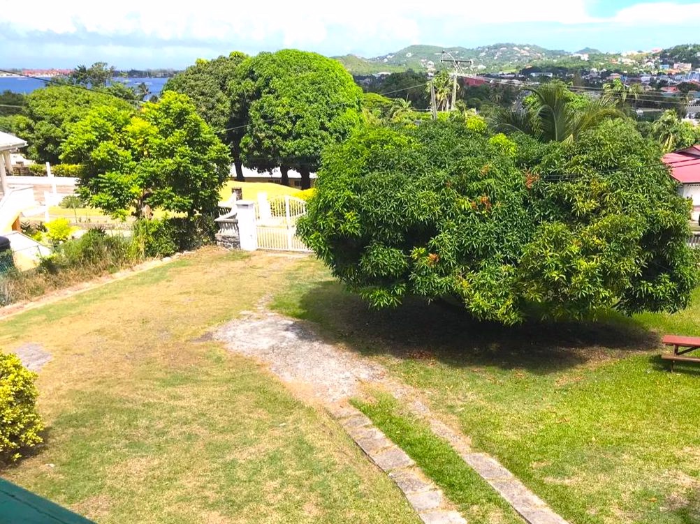 View of the yard from upstair balcony