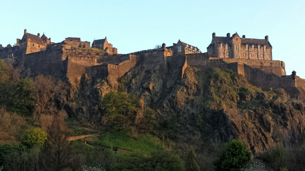 Majestic Edinburgh Castle at sunset.