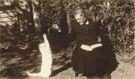 Great Grandmother Lily in old age playing with one of her cats April 1949.