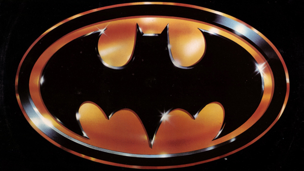 The iconic metallic gold version of the classic Batman emblem created by the film's production designer, Anton Furst.