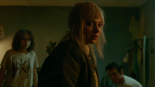 Imogen Poots (center), Alia Shawkat (left), and Anton Yelchin (right) dreading what waits for them outside of the green room.