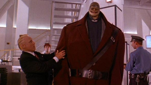 King Koopa (aka Bowser) and a goomba. Yep, it totally looks like the film producers had played the game before.