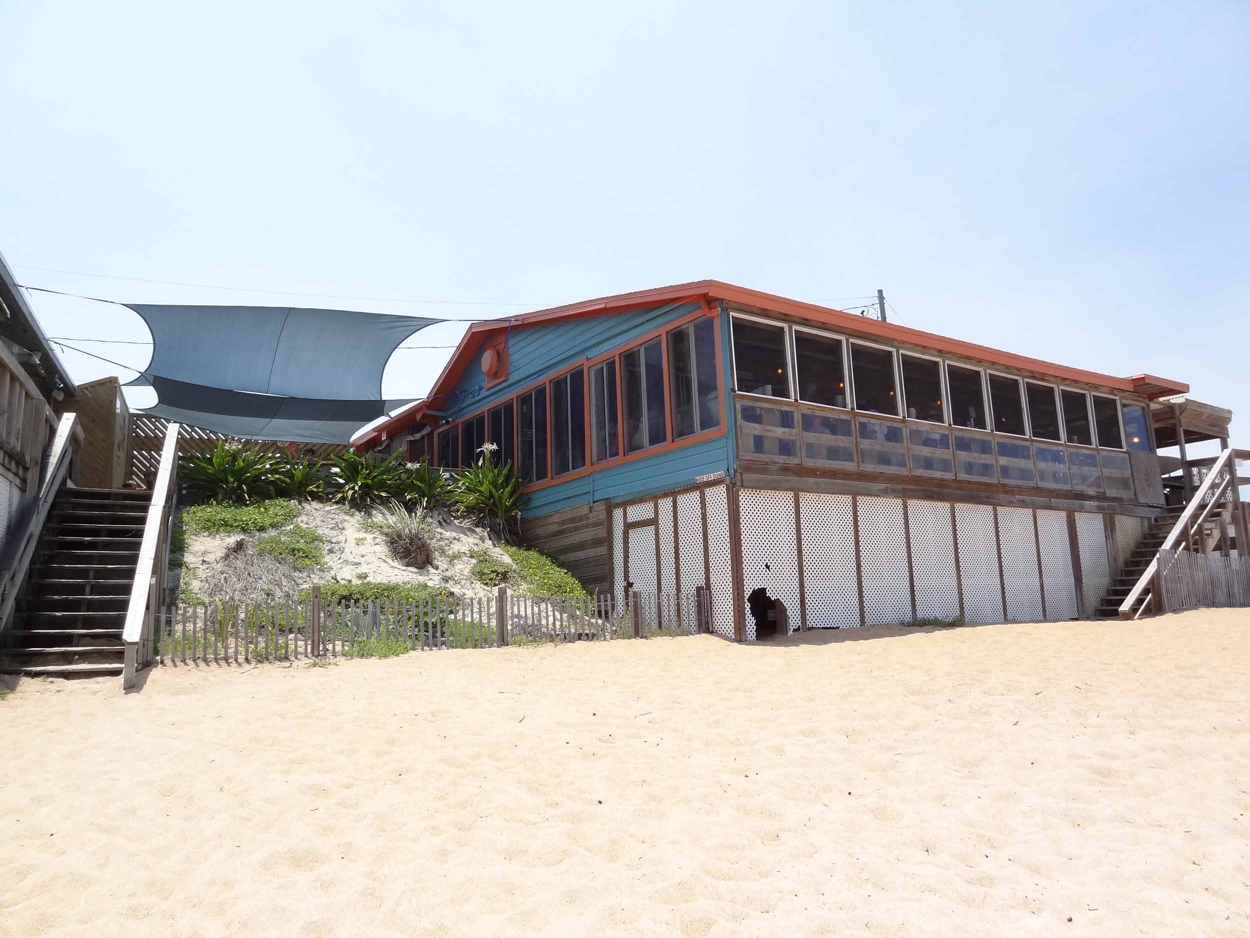 High Tides at Snack Jack Exterior from Beach