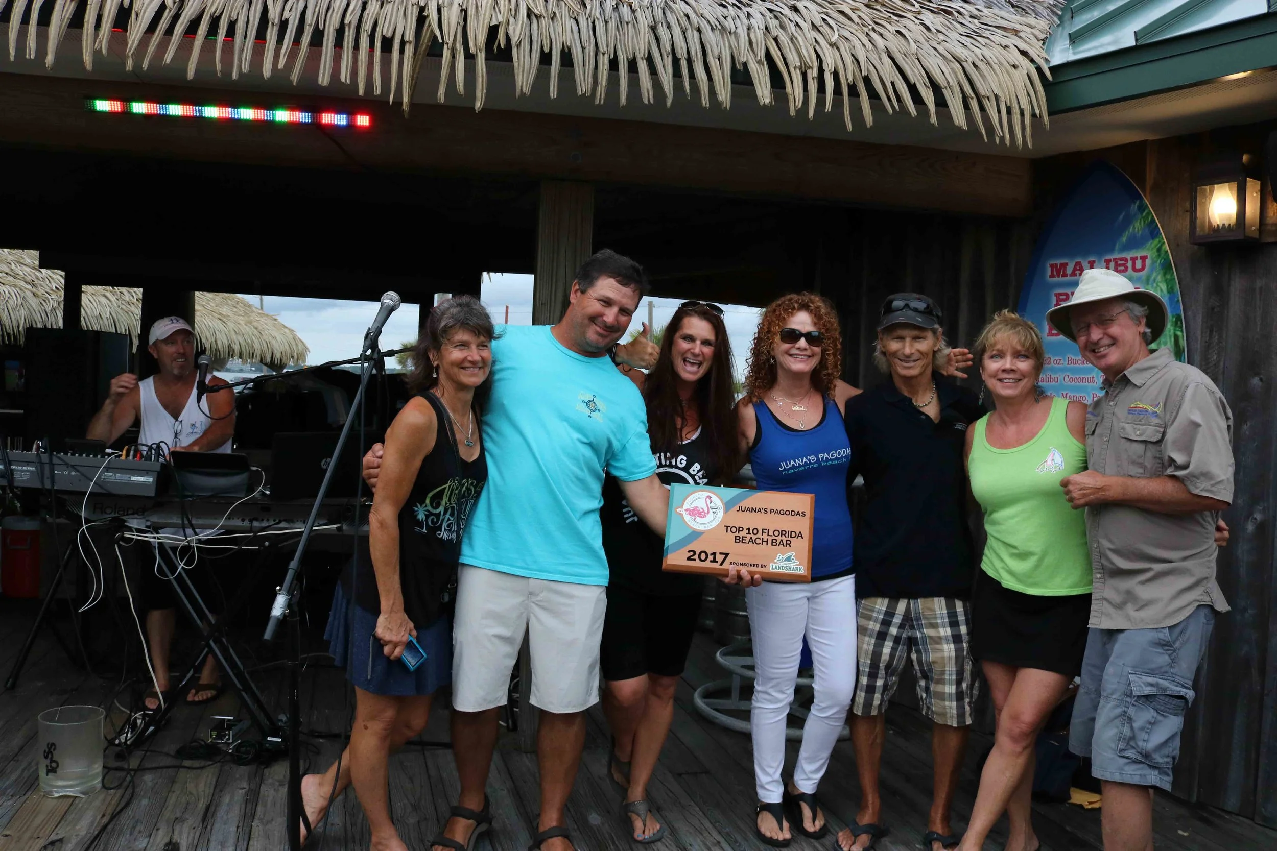 Kevin and his family accept the 2017 Top 10 Florida Beach Bar award