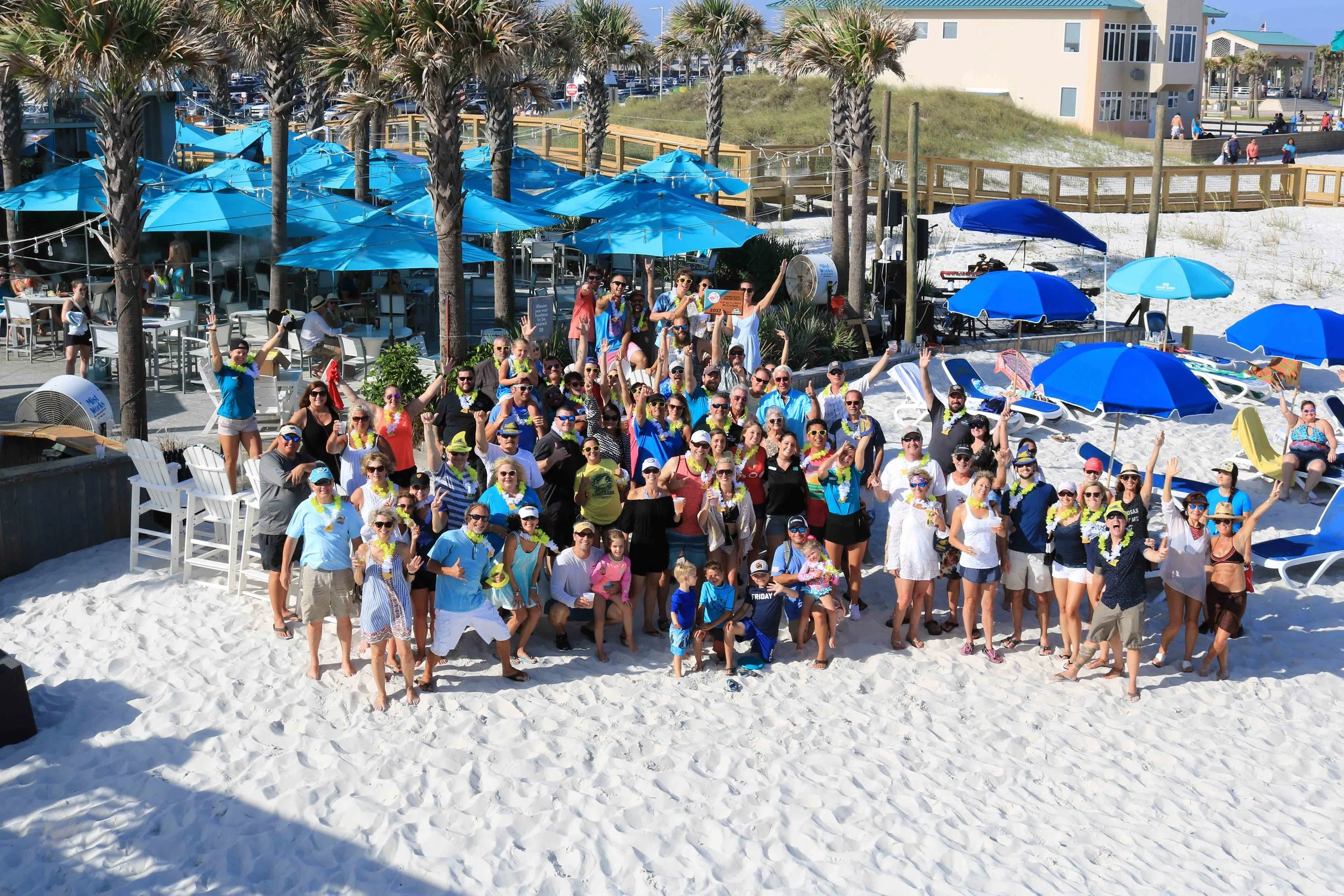 Casino beach bar staff and guests pose on the beach at the 2017 Florida Beach Bar award party