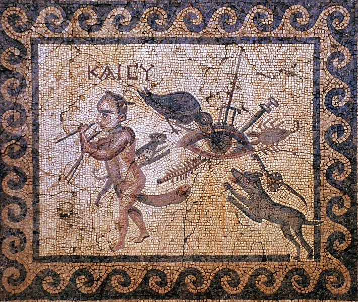 Photo: Wikimedia commons. Text: KAI SU (“AND YOU”, i.e. avert your envious gaze or this will happen to you, too).