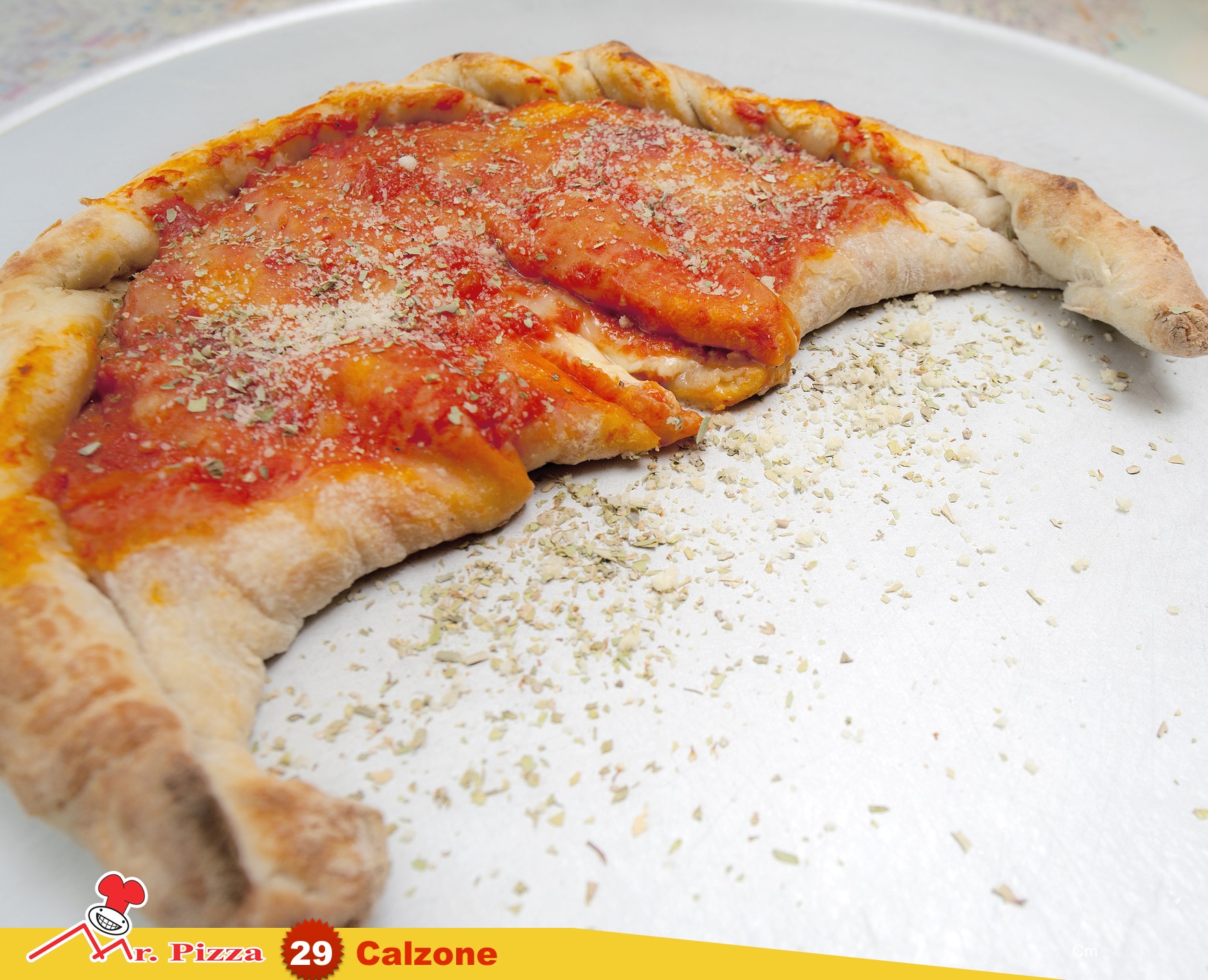 #29 - Calzone Farcito  tomate . mozzarella . fiambre . cogumelos frescos . oregãos