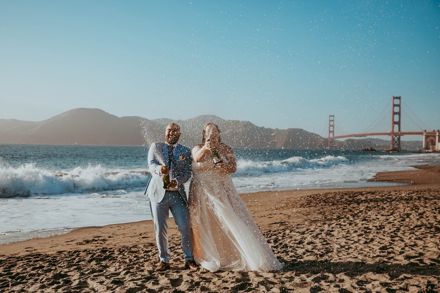 Cheers to love, laughter, and champagne sprays! 🍾💍✨ Celebrating the most incredible San Francisco/Milbrae wedding with the coolest couple who knows how to keep the party going!