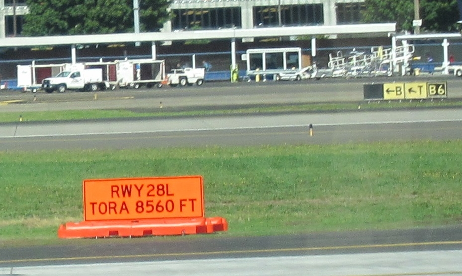 Construction orange airport signage