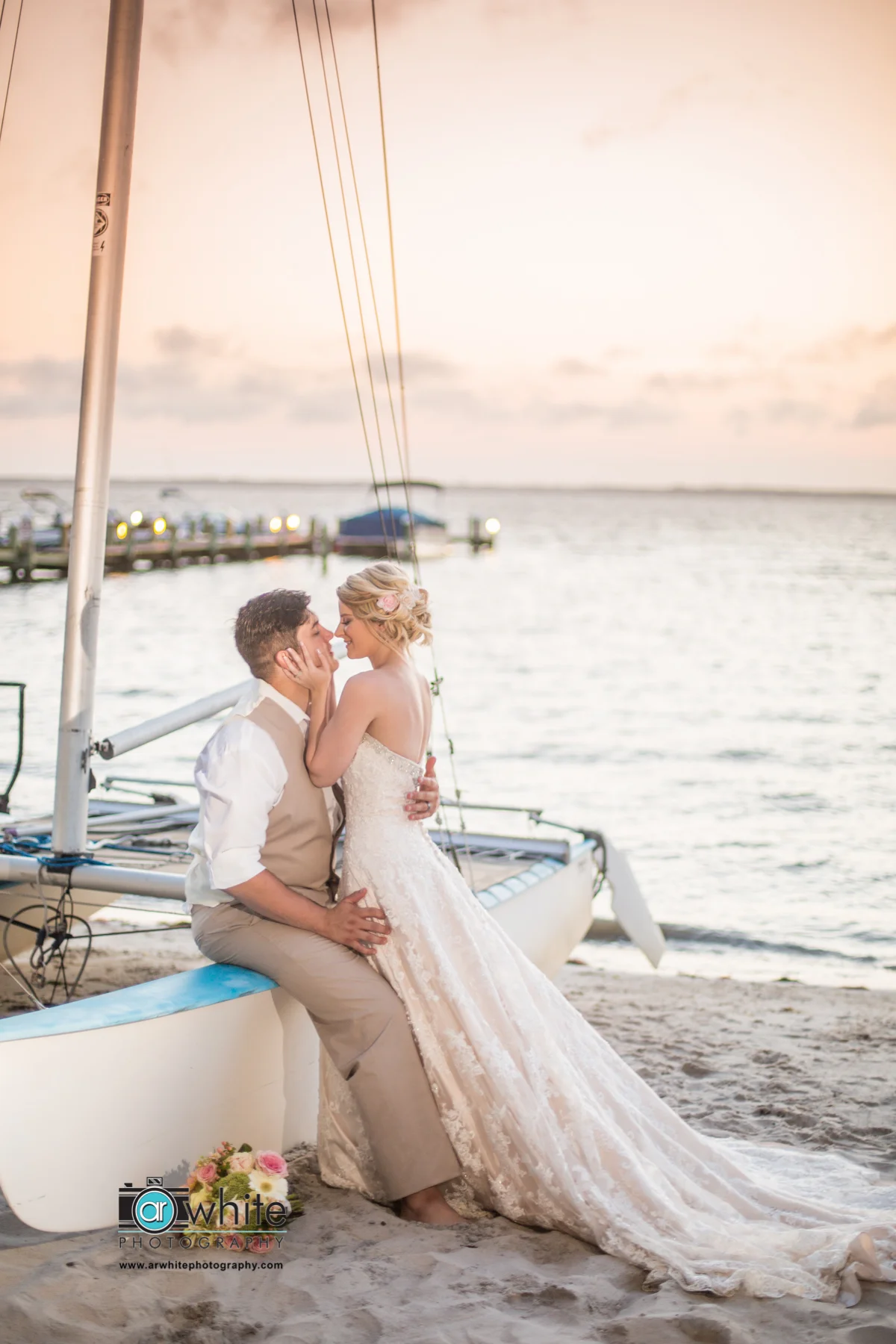 Damen, groom and Brianna, bride enjoy each other's company outside the Princess Bayside hotel in Ocean City.