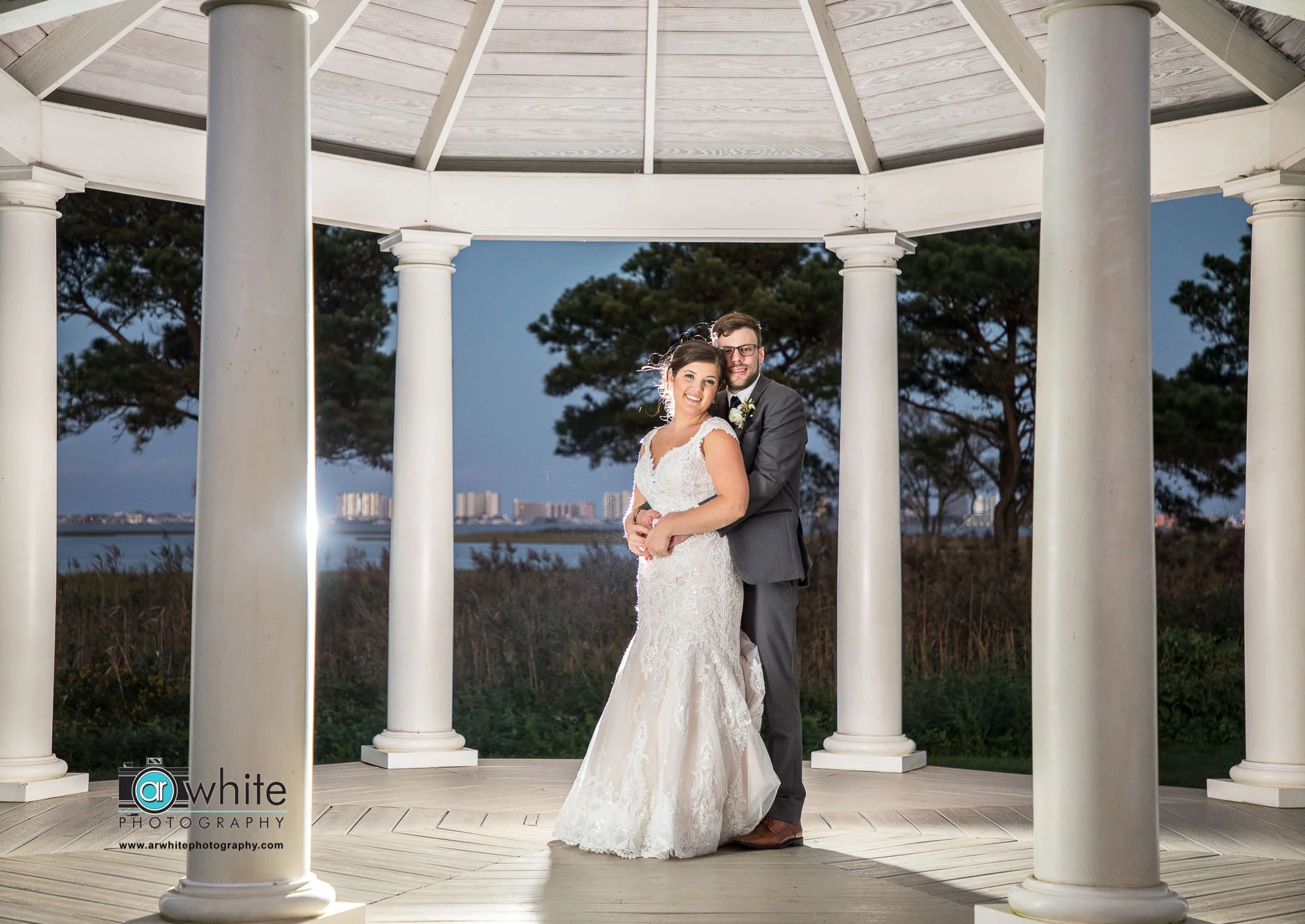 We were able to sneak away during the reception for a couple quick photos at twilight in the gazebo. I love how visible Ocean City is in the background.