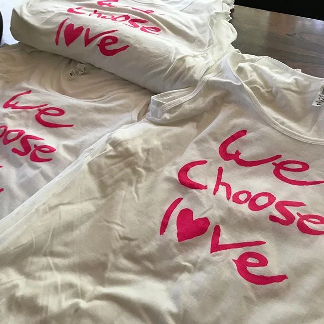 We Choose Love shirts ready to go for tomorrow's PAINT THE PARK PINK breast cancer fundraiser at the US Cellular Baseball field with the Medford ROGUES baseball team... YoMIND is co-sponsoring the event with RASA Yoga. These WE Choose L❤VE shirts wil