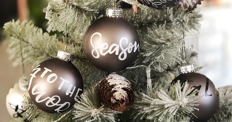 Hand lettered ornaments add a personal touch to your Christmas decorating