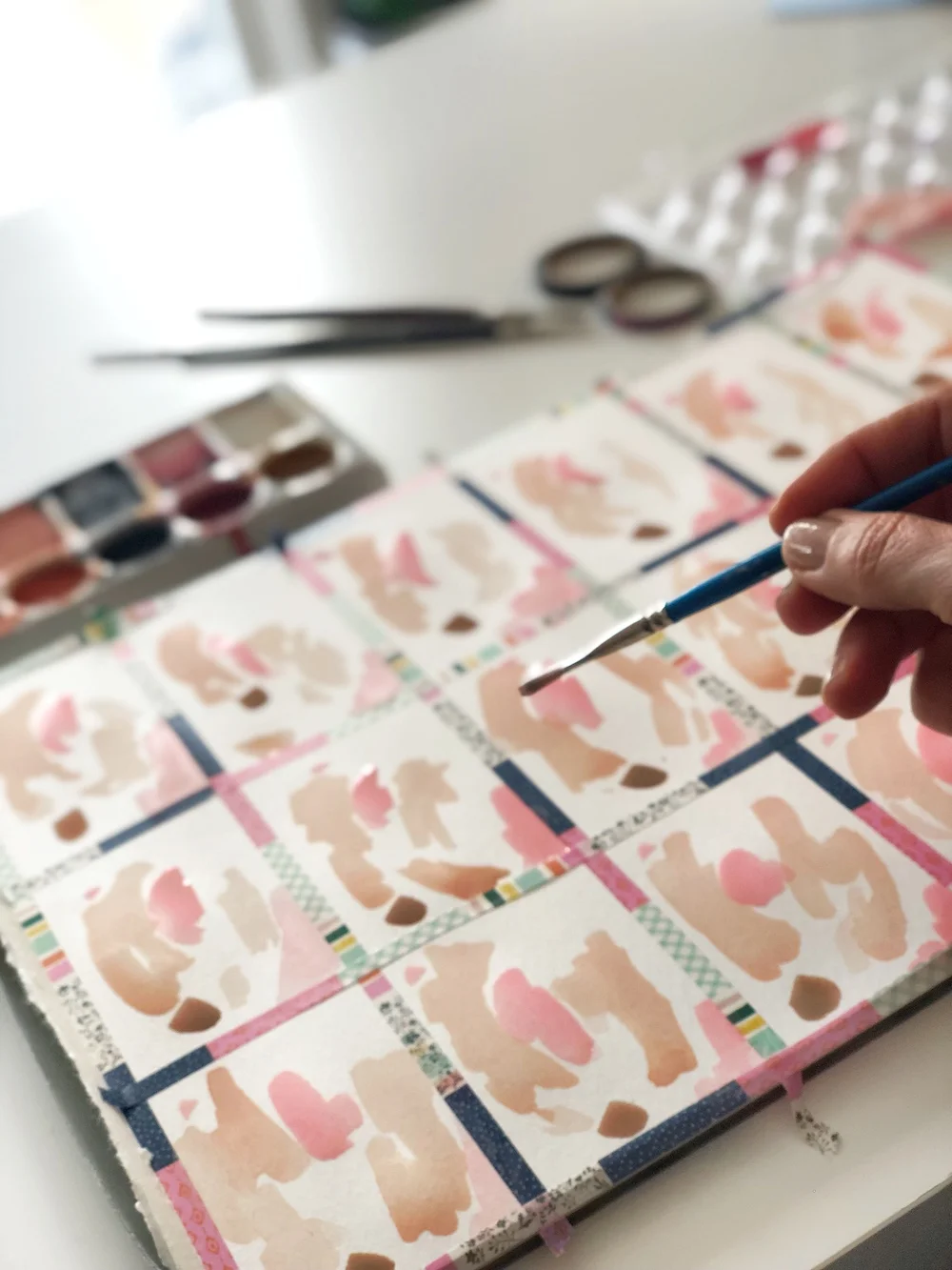 Use watercolor paints that are in the same color family