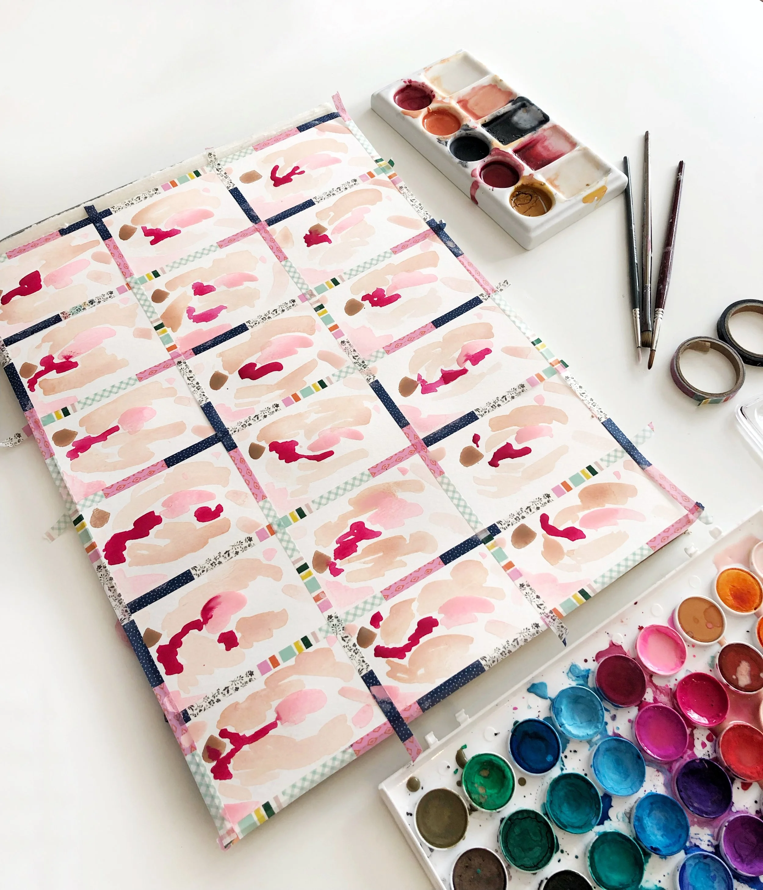 Don’t be afraid to add contrasting watercolors and even bold, more opaque pops of color, like the bright pink and even touches of black.