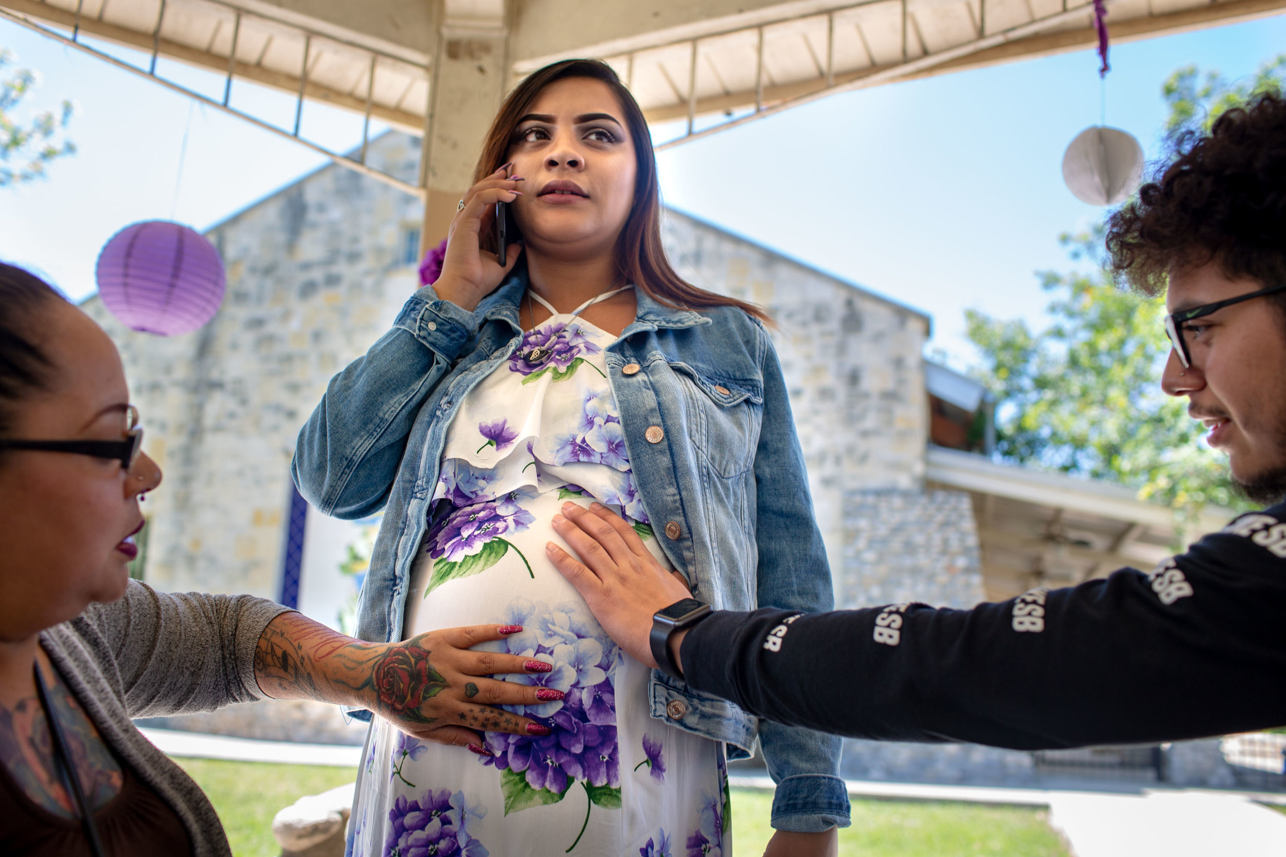  Savanna Garcia, 16, calls her father during her baby shower on April 15, 2018. Like many other pregnant teenagers in San Antonio, Garcia has relied on a makeshift sisterhood of support throughout her pregnancy because the men in Garcia’s life are un