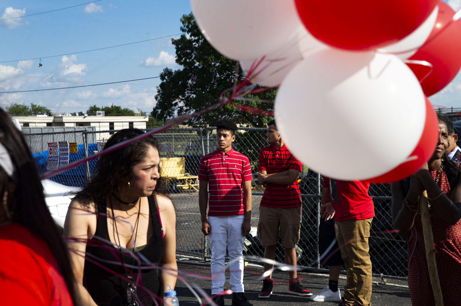  Mourners gather for the memorial vigil of 19-year-old Devonte Ortiz after he was fatally shot by neighbor in the early hours of July 4, 2019 in a dispute about fireworks. 