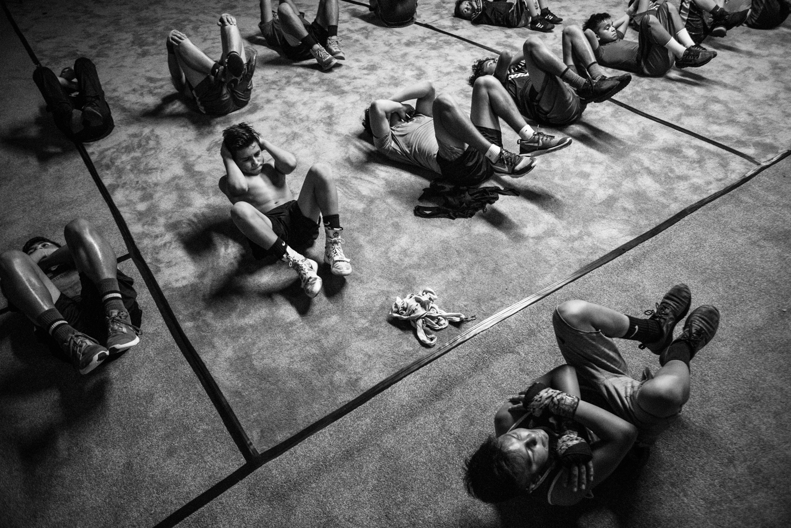  The members of the Junior Olympics team at Ramos Boxing complete a workout routine on April 12, 2017 in San Antonio, Texas. The routine is part of an intensive training regimen designed for the amateur boxers in preparation to compete in the South T