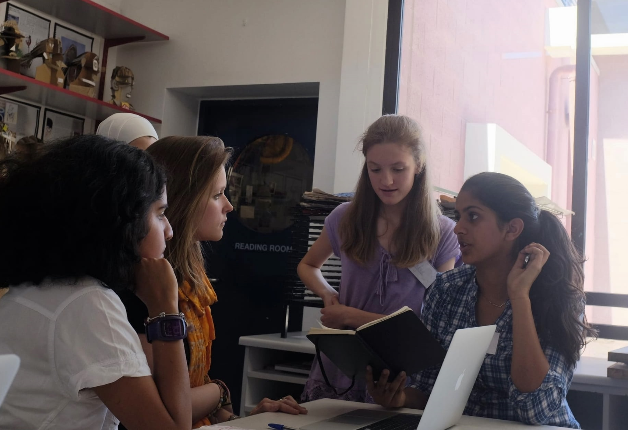 Mentoring in action - a group of young women at Dubai College put their passions and minds together to create a climate change campaign at school