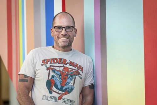Dustin Kidd in a Spider-Man tee-shirt.