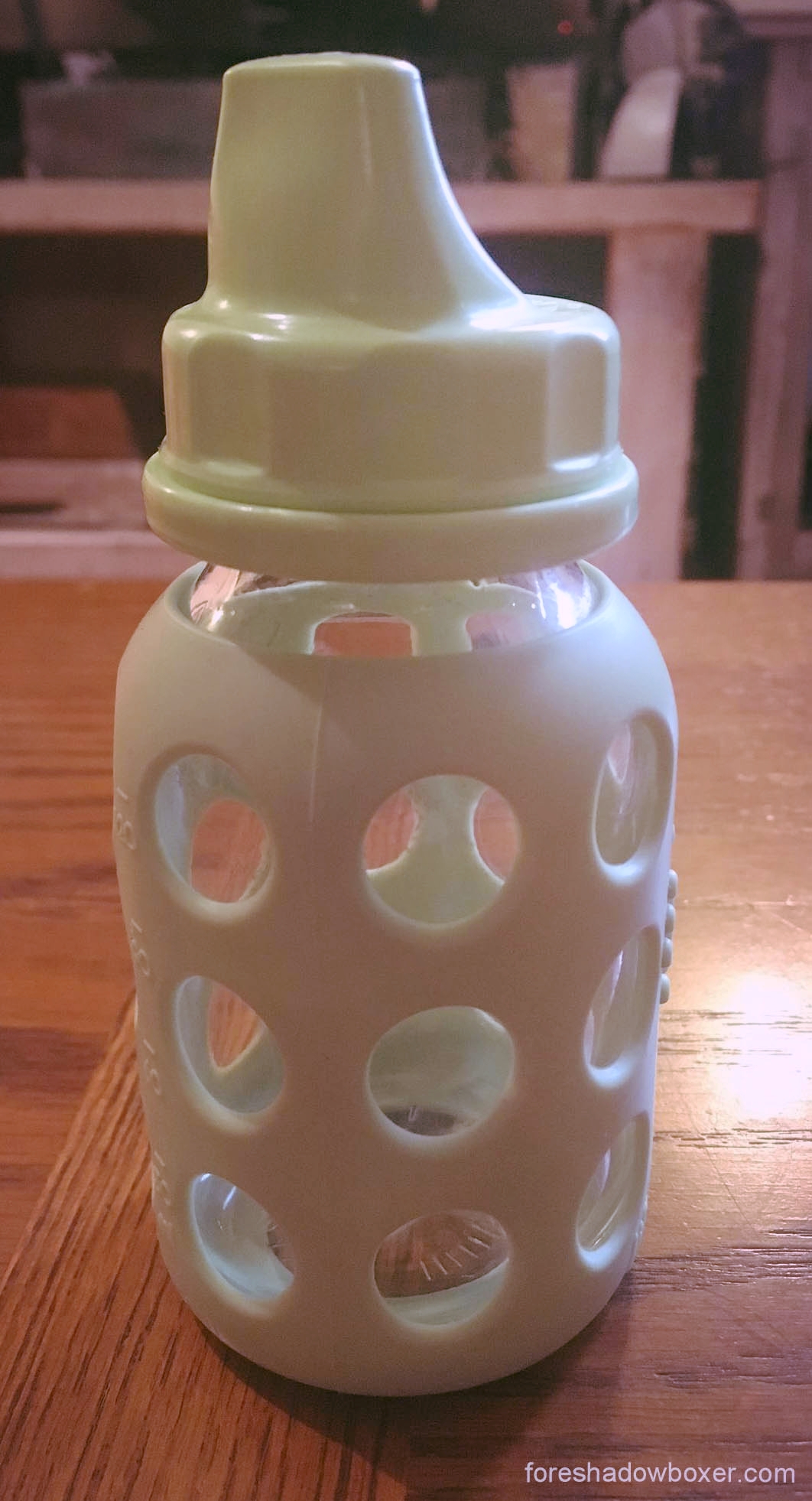  The Life Factory sippy cup adapters are a step in the right direction, but their plastic design undermines the reason you probably chose glass in the first place.  