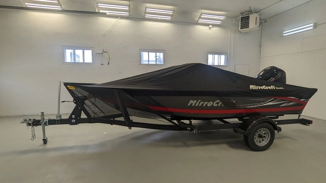rock guard attached to fishing boat