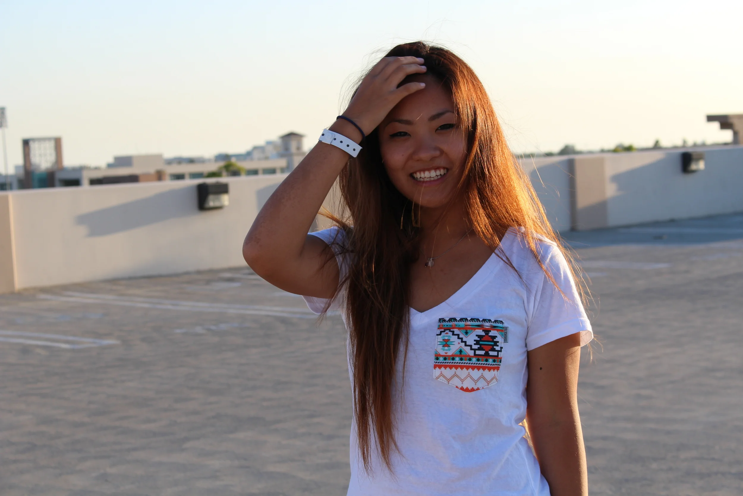 Here's Eileen wearing the fabric Brasilia, which is from Brazil. It contributes to the Whole Planet Foundation, which provides micro loans to women in over 60 different countries