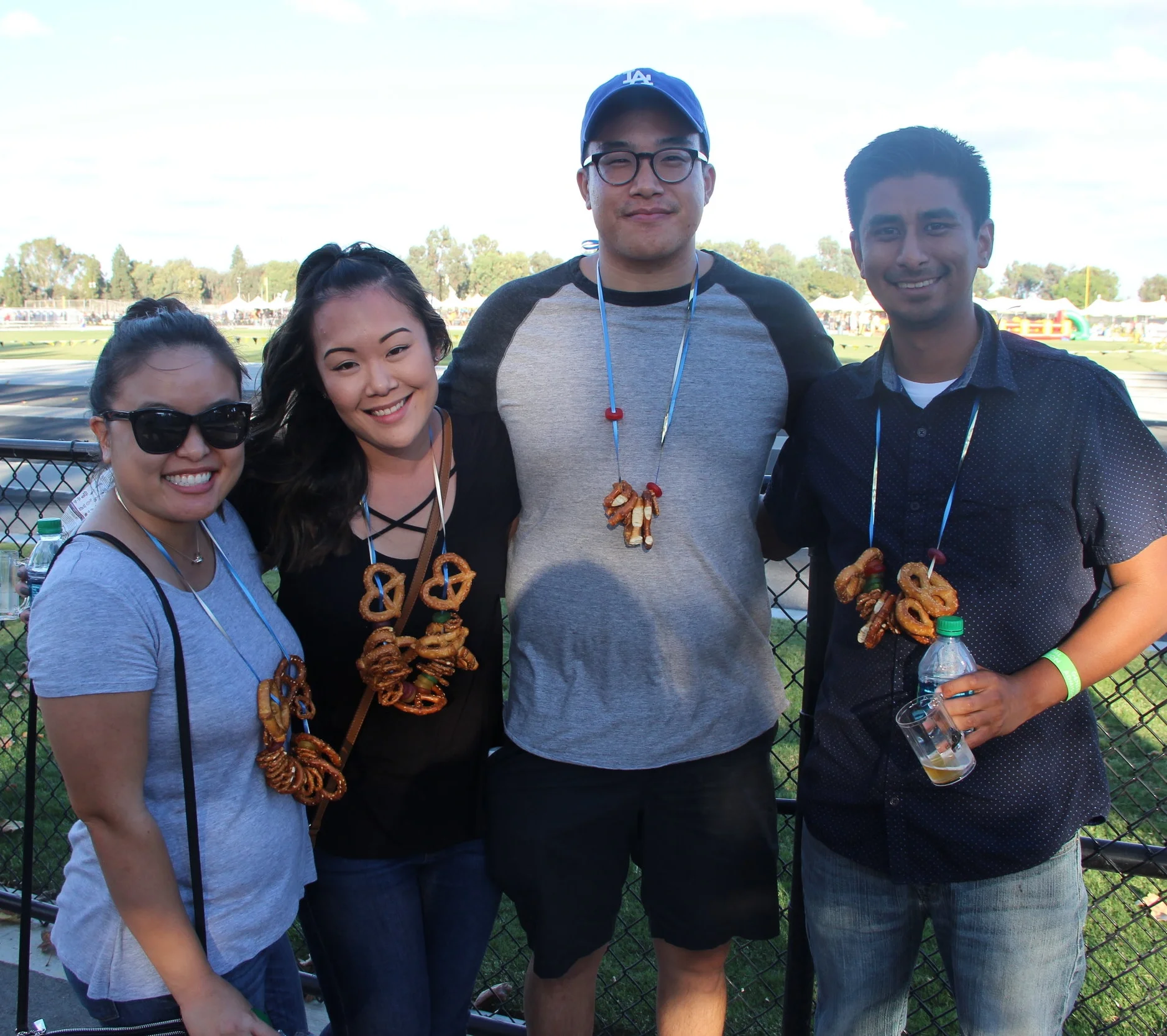 Christina Khong (far left) wears a matching pretzel-and-lifesavers necklace with her friends.