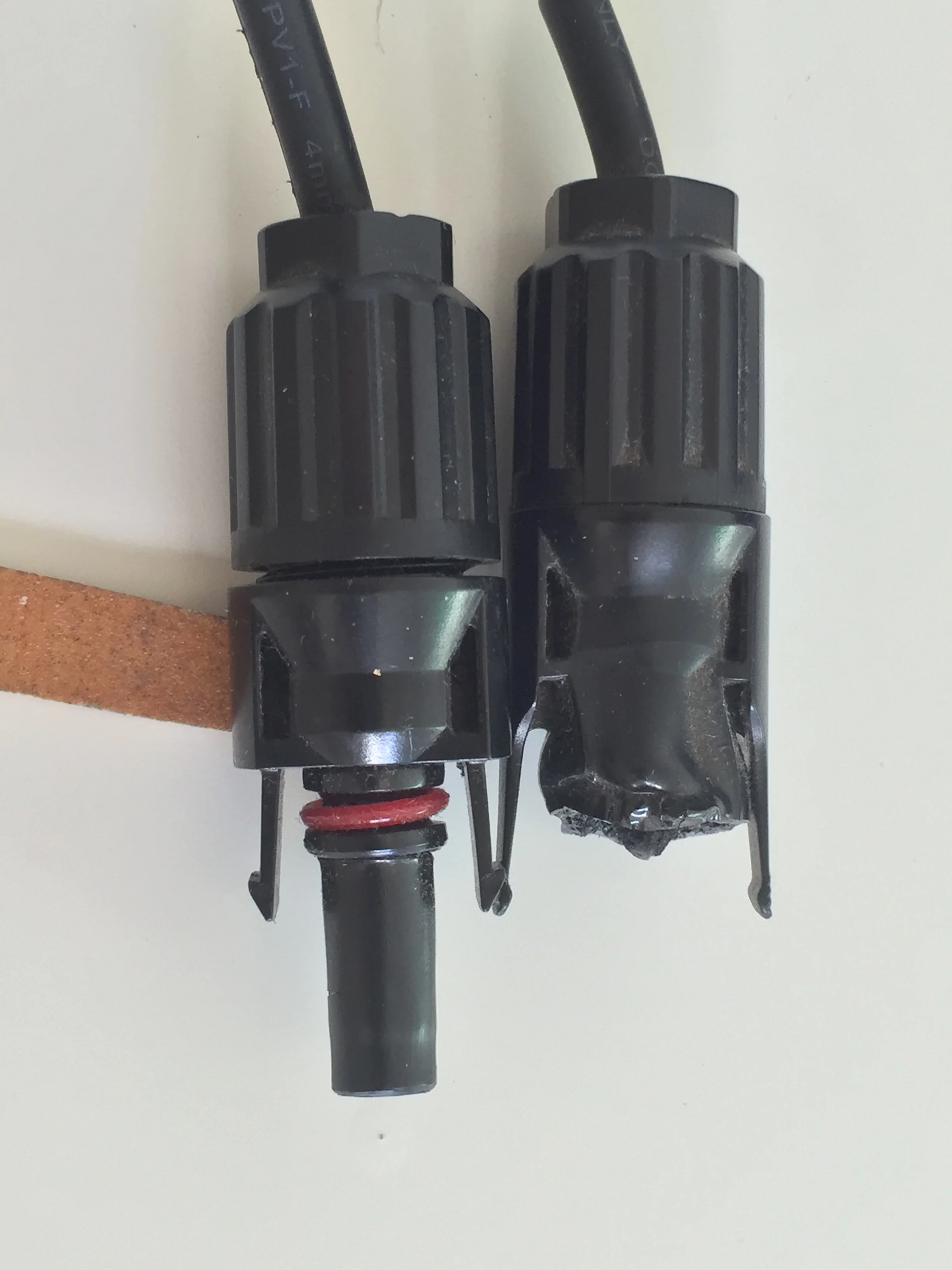 •  On the right: melted, failed connector prevented power going into the batteries