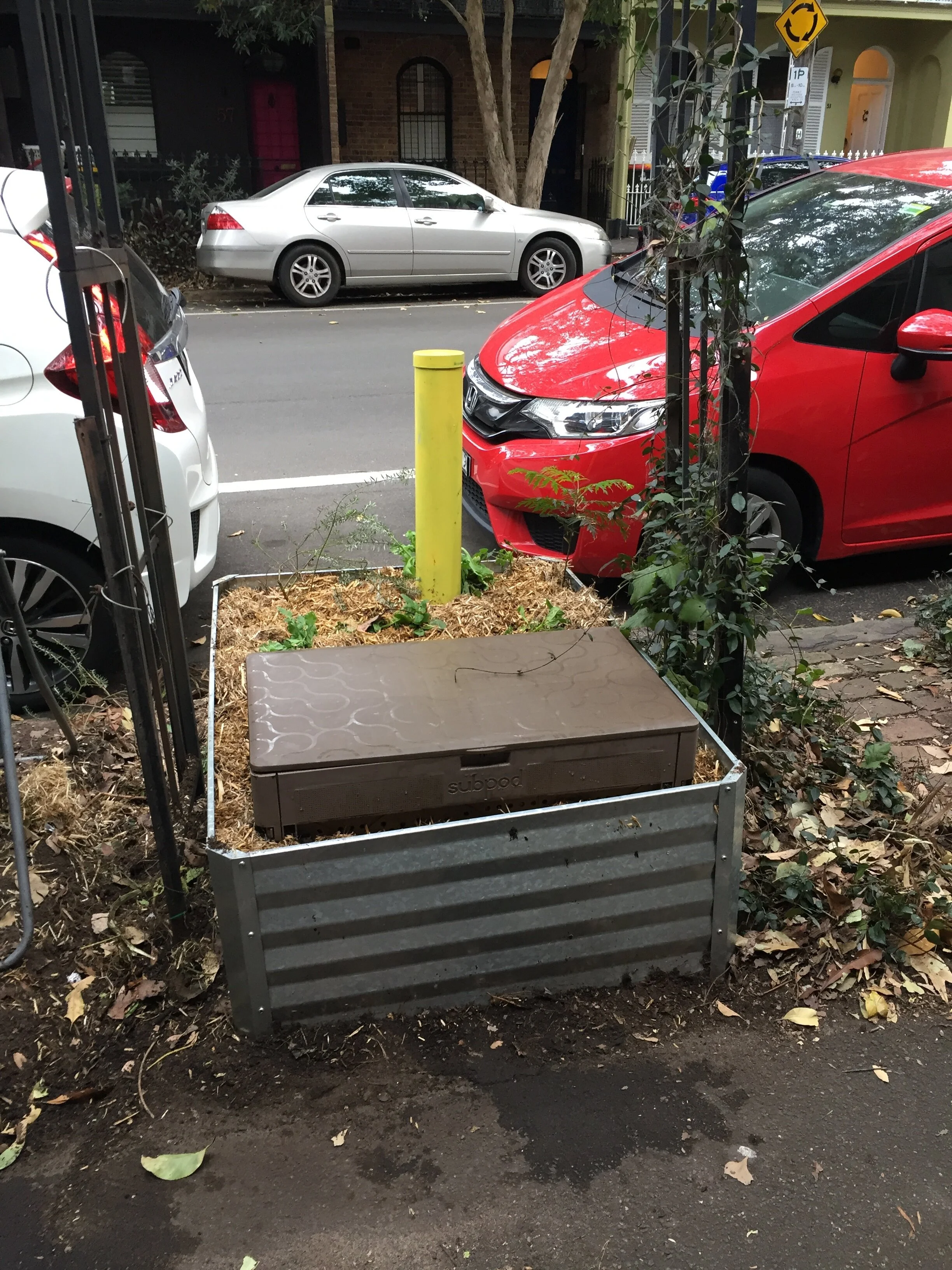 • The seat inside the raised bed garden outside my house