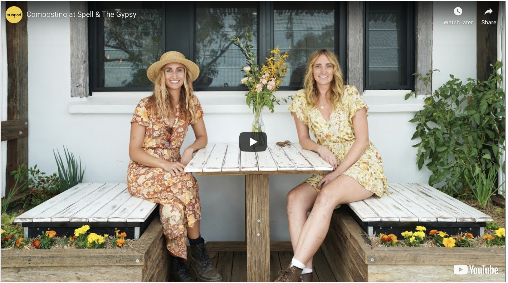 •   Two Subpods on concrete. Each of the two women is sitting on a Subpod.
