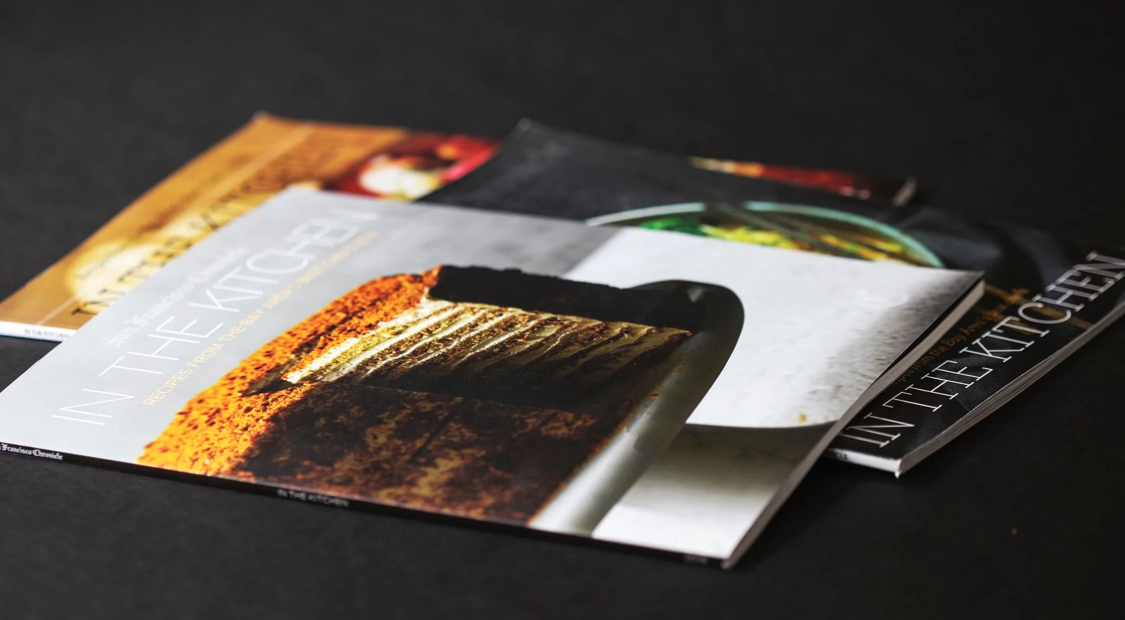 In the Kitchen is an annual series of recipe books published by the San Francisco Chronicle. It features star chefs of the Bay Area, such as Tyler Florence, Gonzolo Guzman, and Dilsa Lugo presenting recipes they really like. I’ve been working on these the last three years. Art Direction and design by Tracy Cox.