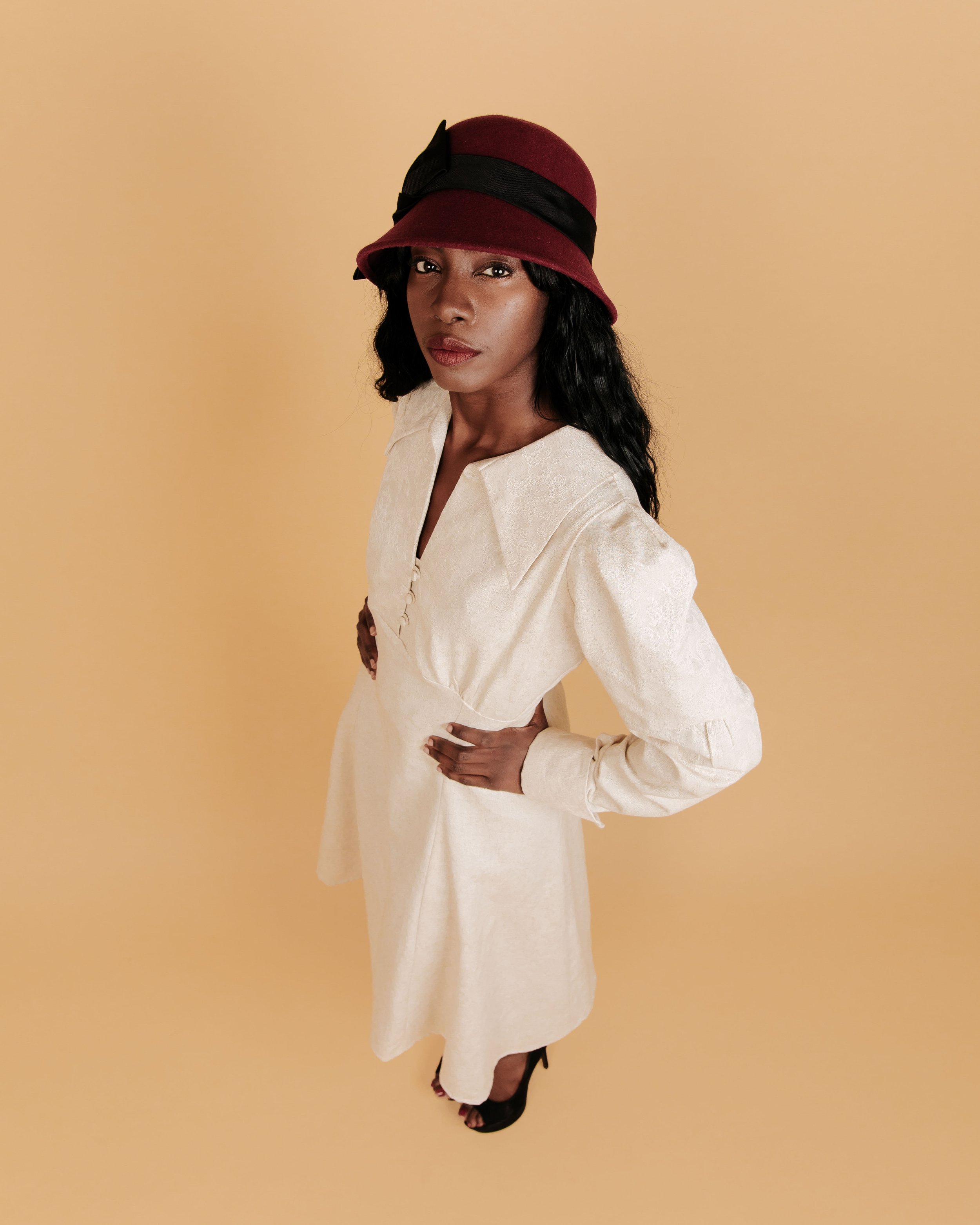 Terre_Amoure_Cream_Dress_Red_Hat_Model_Bespoke_Dress.jpg